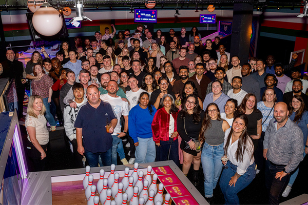 Colleagues enjoying a social night at Yuno Energy