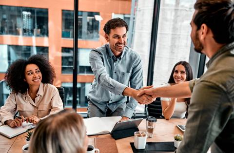 Happy Yuno Energy Customers at a business meeting