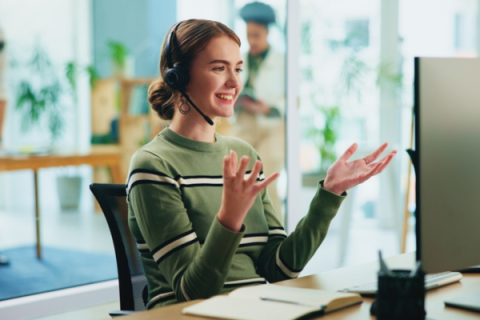 Happy customer care agent on the phone